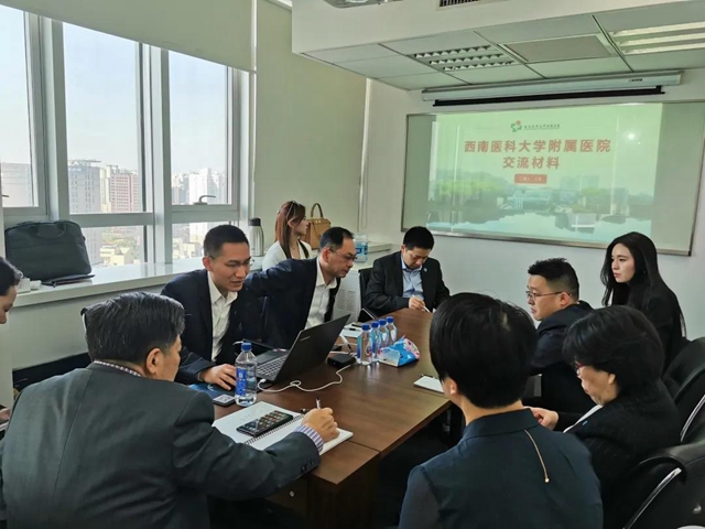 西南医大附院院长江涌带队前往复旦医院研究所学习交流
